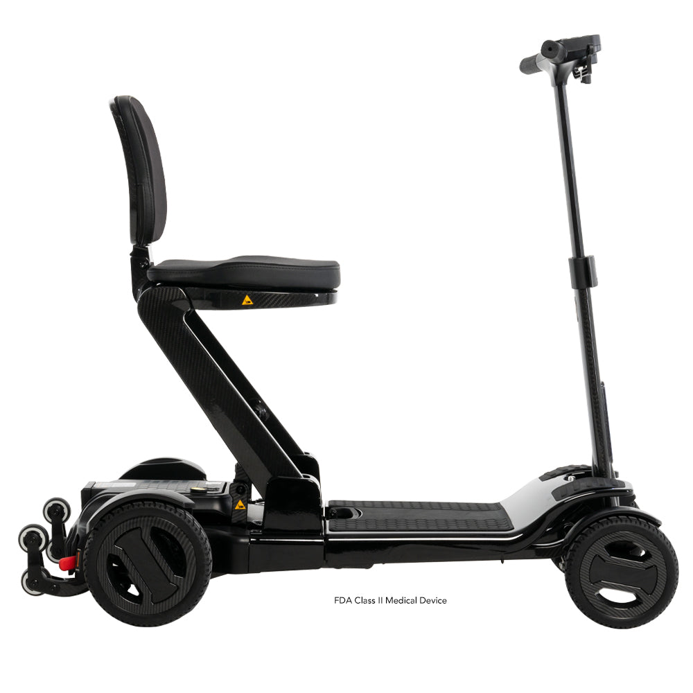 Right side view of the lightweight Go Go Carbon folding travel scooter.