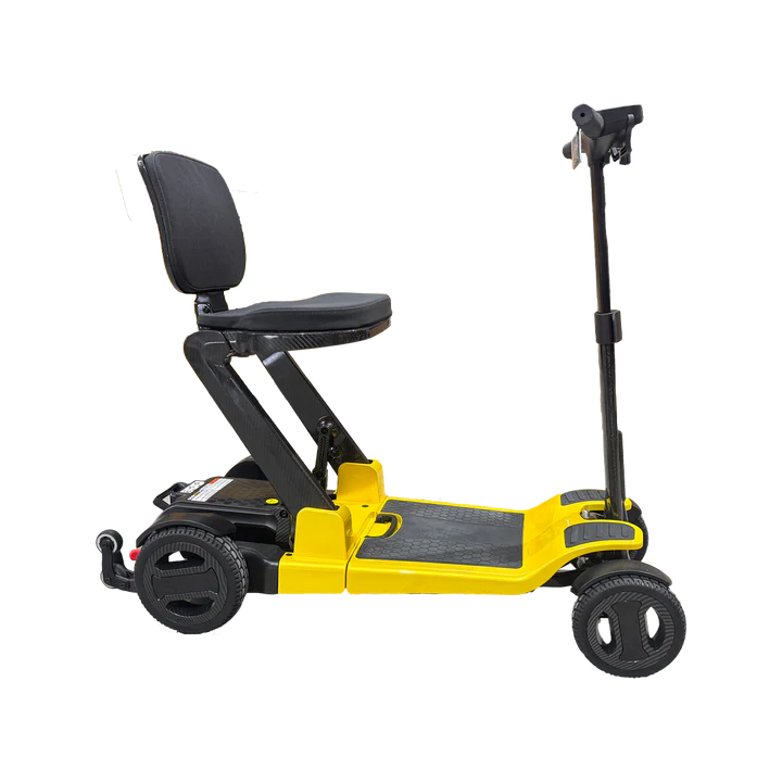 Side profile view of the Pride Mobility Go Go Carbon lightweight carbon fiber folding mobility scooter in yellow.