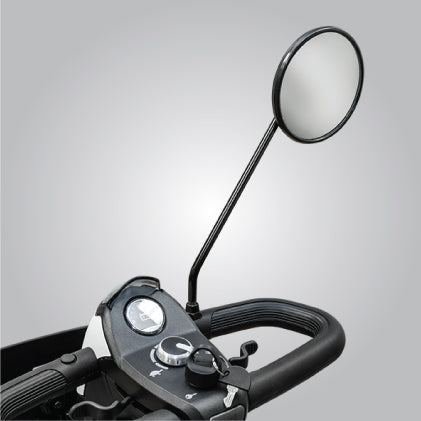 Close-up view of the Pride Mobility Universal Rearview Mirror securely installed on a mobility scooter tiller, providing enhanced rear safety and awareness.