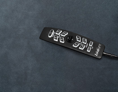Pride VivaLift Ultra remote with headrest lumbar back legrest and tilt controls