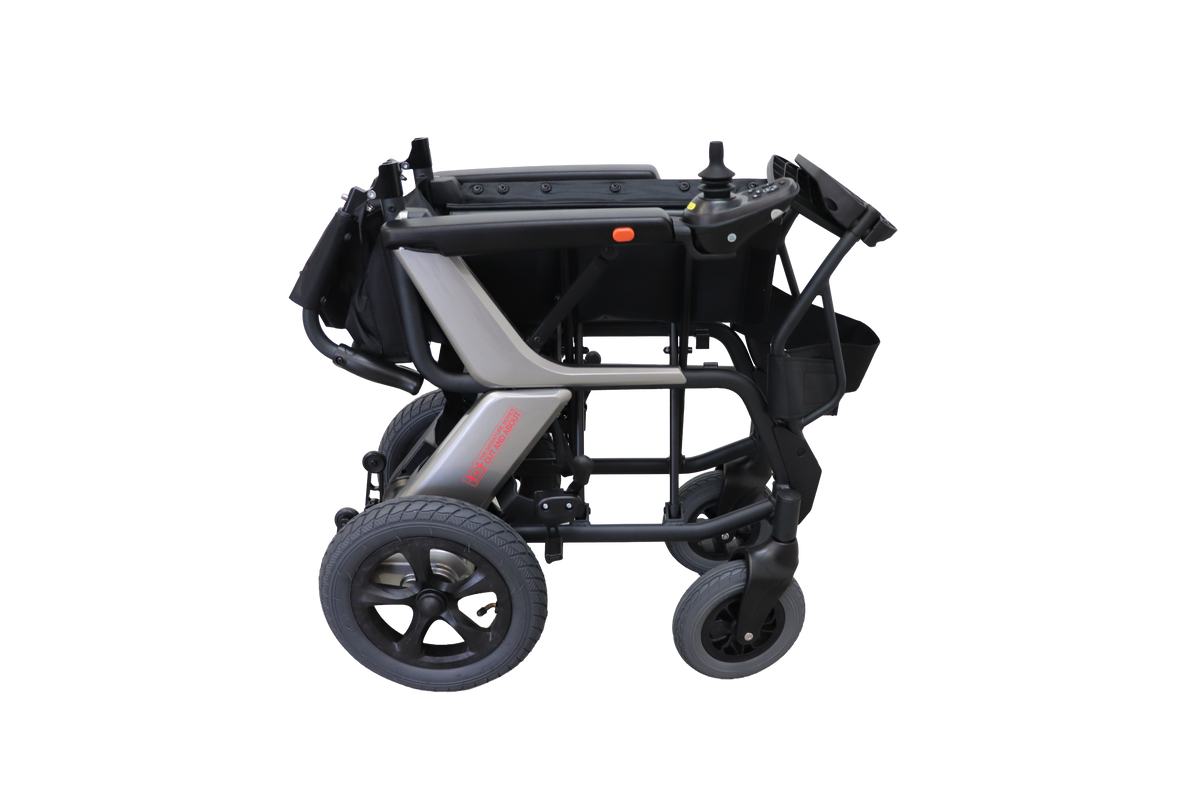 Signature Series Out & About power wheelchair with the backrest lowered and footrests raised