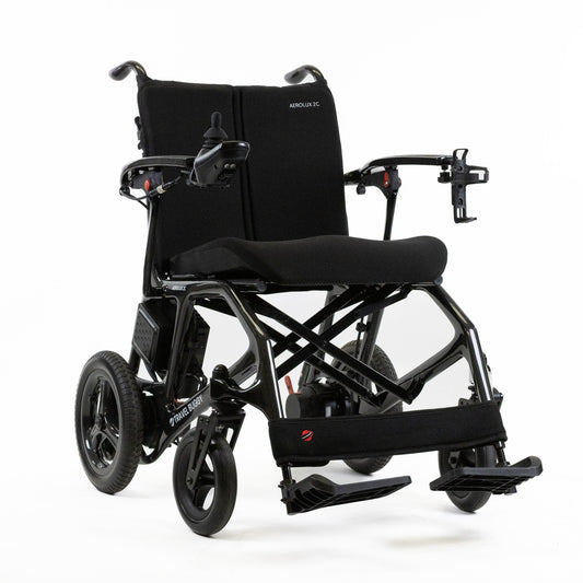 Travel Buggy AEROLUX 2C folding power chair, front right three-quarter view on a white background