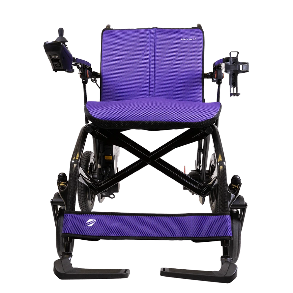 Vibrant purple 3-piece replacement cushion set installed on the Travel Buggy AEROLUX 2C power wheelchair.