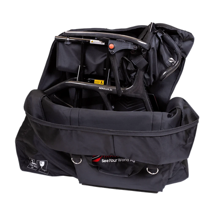 Travel Buggy AEROLUX 2C carbon fiber power wheelchair folded securely inside the custom fitted travel bag.