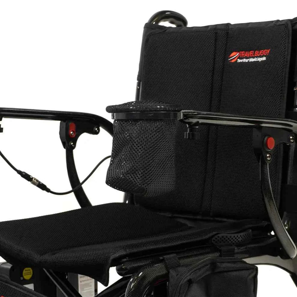 Flexible mesh cup holder accessory securely mounted to the armrest of a Travel Buggy power chair.