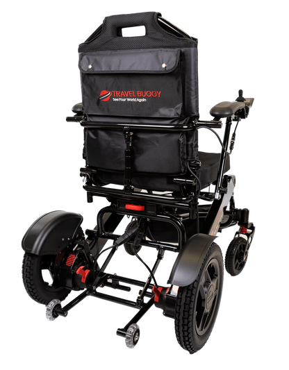 Rear view of the black Travel Buggy City 2 Plus electric wheelchair showing the backrest and anti-tip wheels.