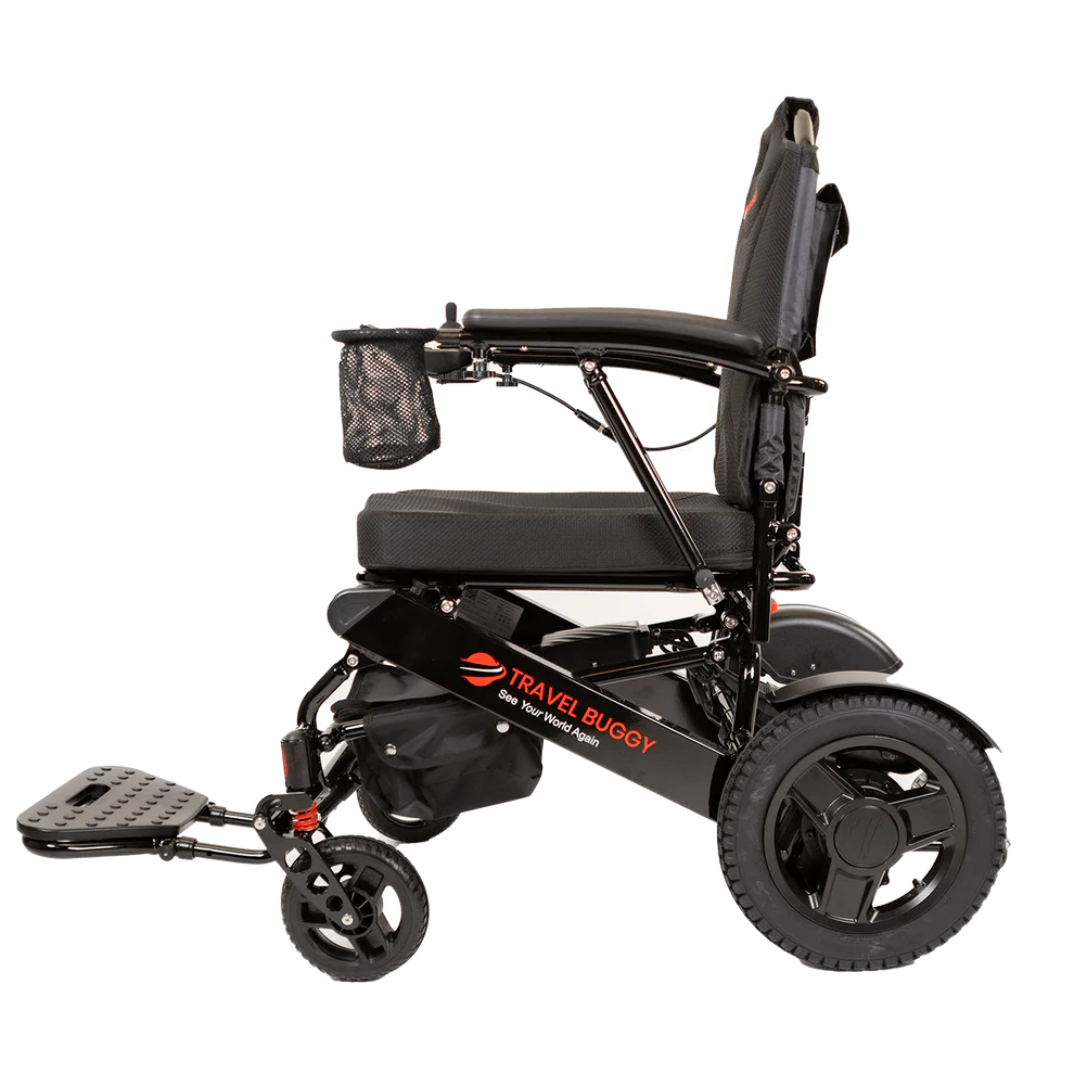 Side profile of the Travel Buggy City 2 Plus mobility chair in black featuring large rear wheels and comfortable armrests.