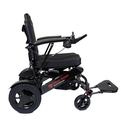 Side angled view of the black Travel Buggy City 2 Plus highlighting the intuitive joystick control and sturdy frame.