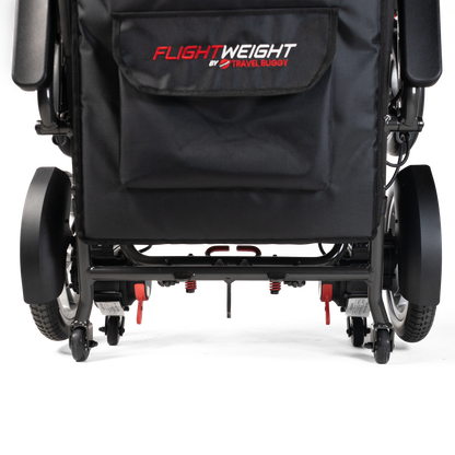Folded Travel Buggy DASH 3 on its built-in wheels, ready to roll like a suitcase