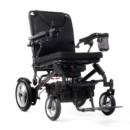 Travel Buggy DASH 3 folding power wheelchair, front right three-quarter view on a white background