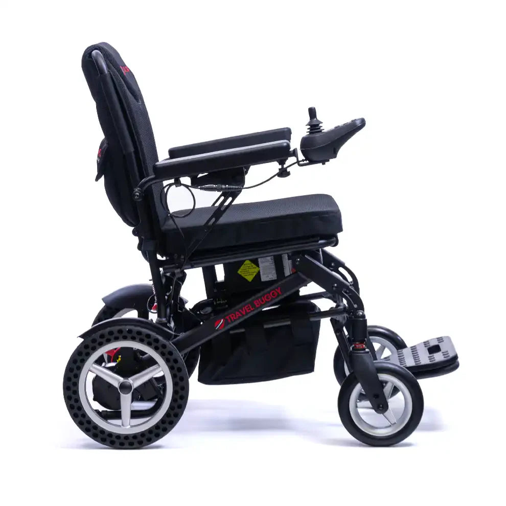 Side profile of the Travel Buggy Dash folding power chair demonstrating its modern, compact frame design.