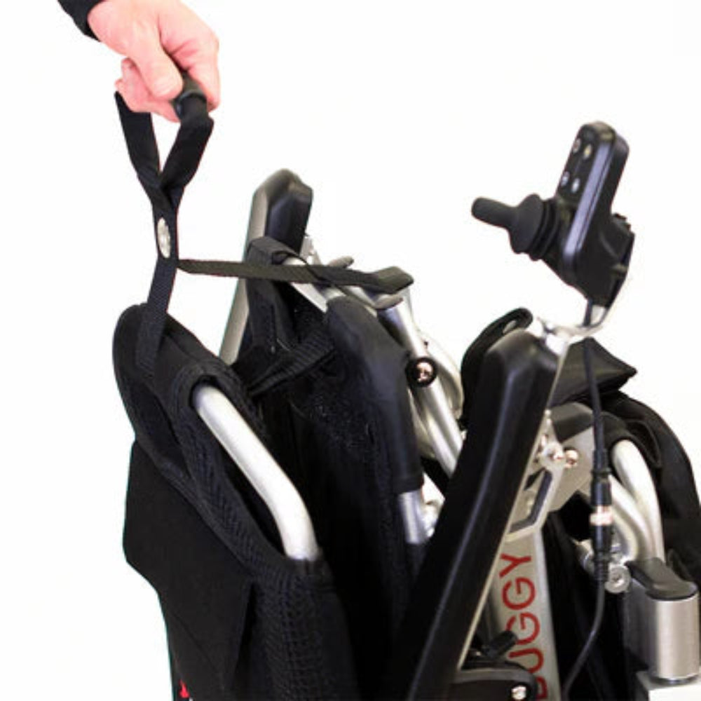 Travel Buggy Easy-Lift strap securely attached to a folded power chair to assist with safe lifting and handling.