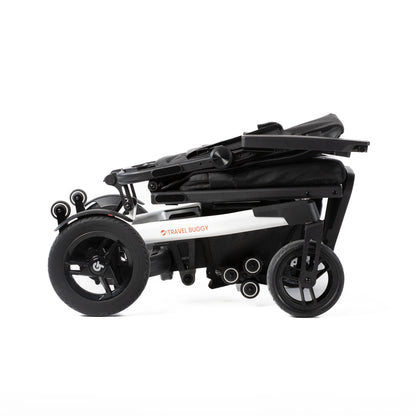 White Travel Buggy Grand Tourer GT power wheelchair folded flat, right side view on a white background