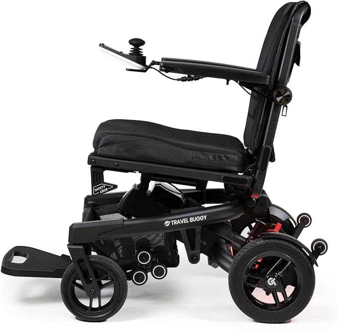 Side profile of the Travel Buggy Grand Tourer GT electric wheelchair featuring large rear wheels and ergonomic armrests.