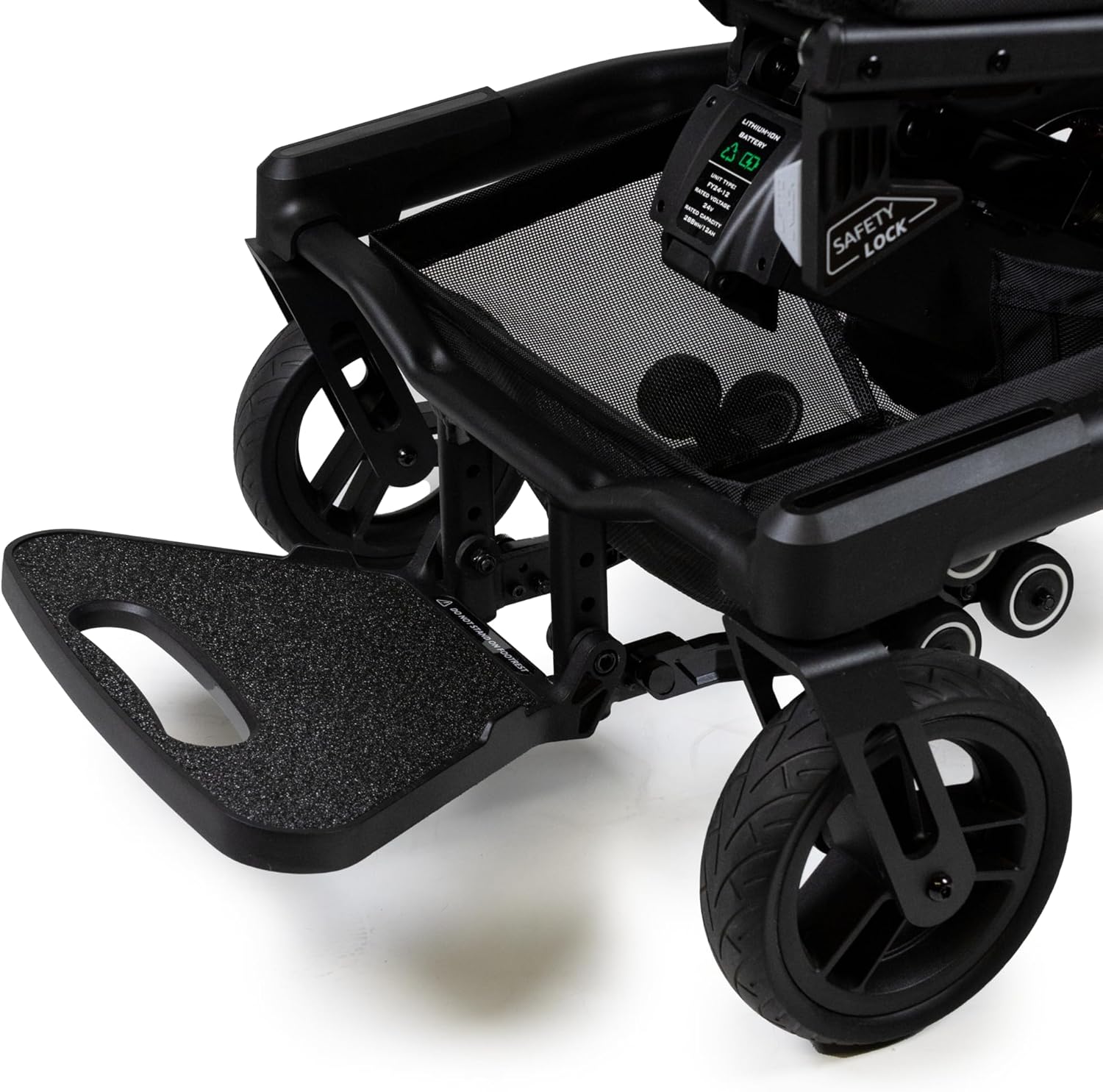 Detailed view of the sturdy rear tires and safety anti-tip wheels on the Travel Buggy Grand Tourer GT power chair.