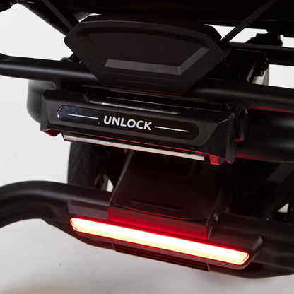 Close-up of the bright red rear LED taillight on the Travel Buggy Grand Tourer GT for enhanced nighttime safety.