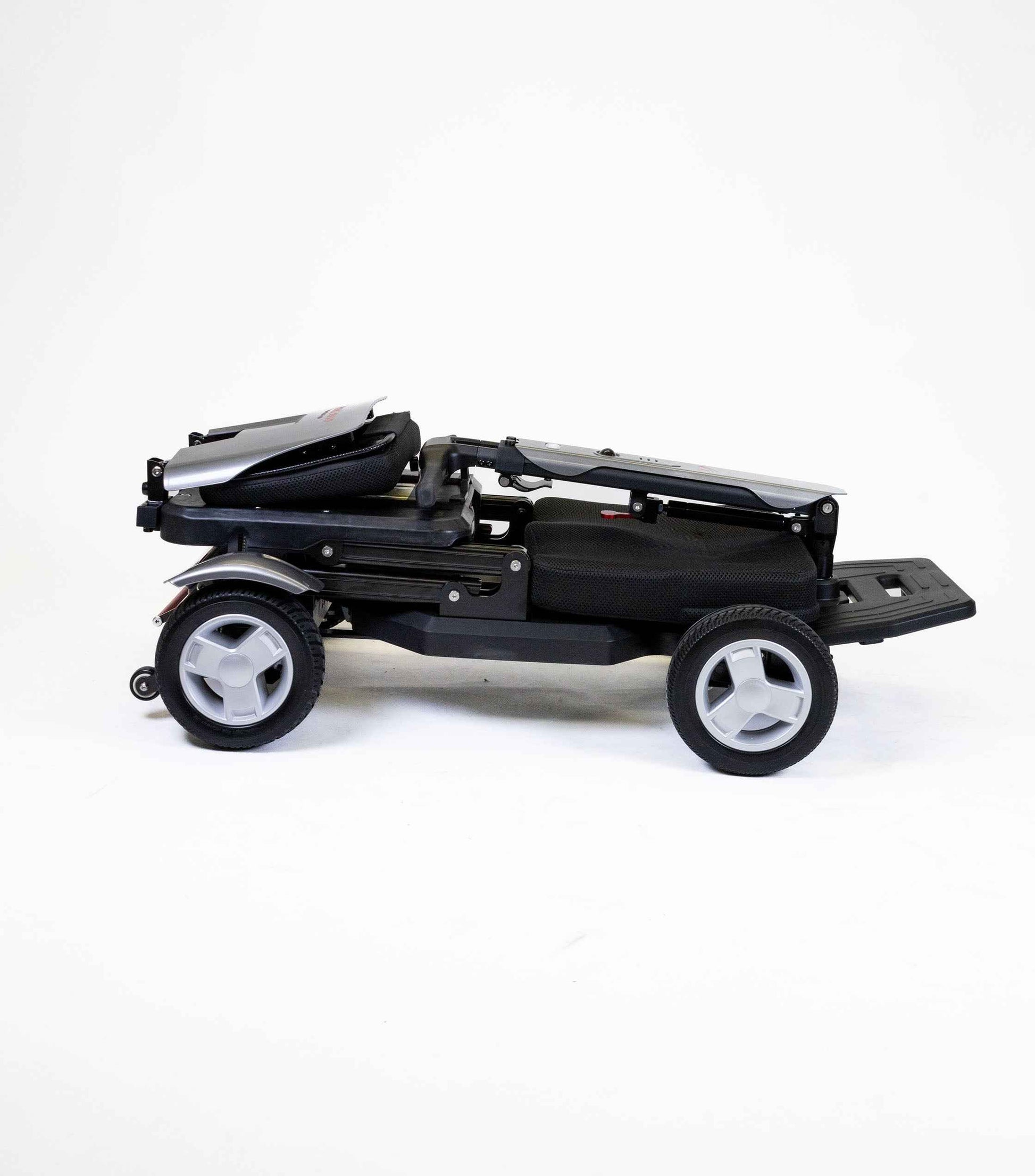 Compact folded Travel Buggy HELIX mobility scooter for easy transport – CareMade