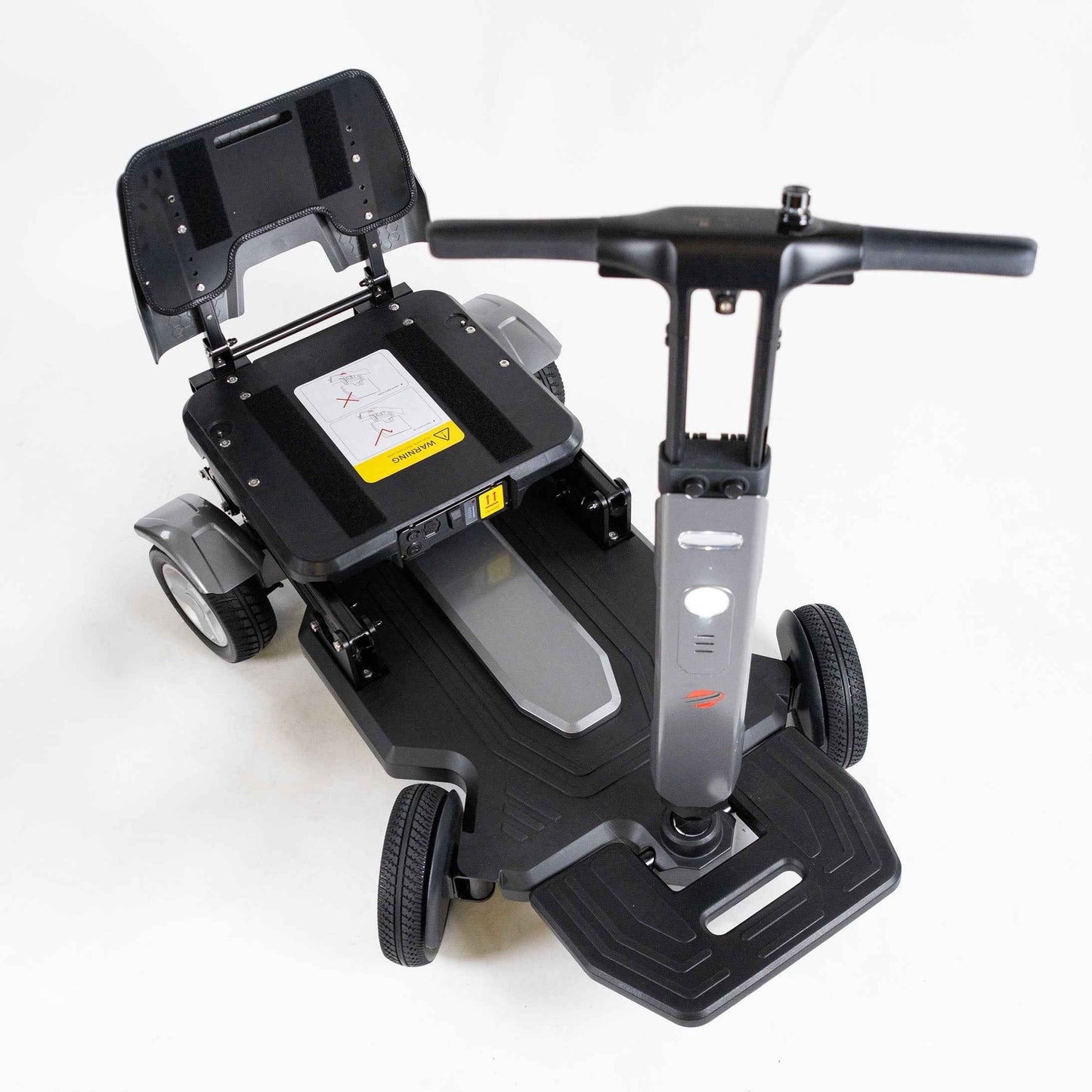 Close-up of Travel Buggy HELIX scooter battery compartment – CareMade