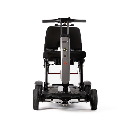 Travel Buggy HELIX foldable mobility scooter seen head on, showing its 24 inch width, Care Made