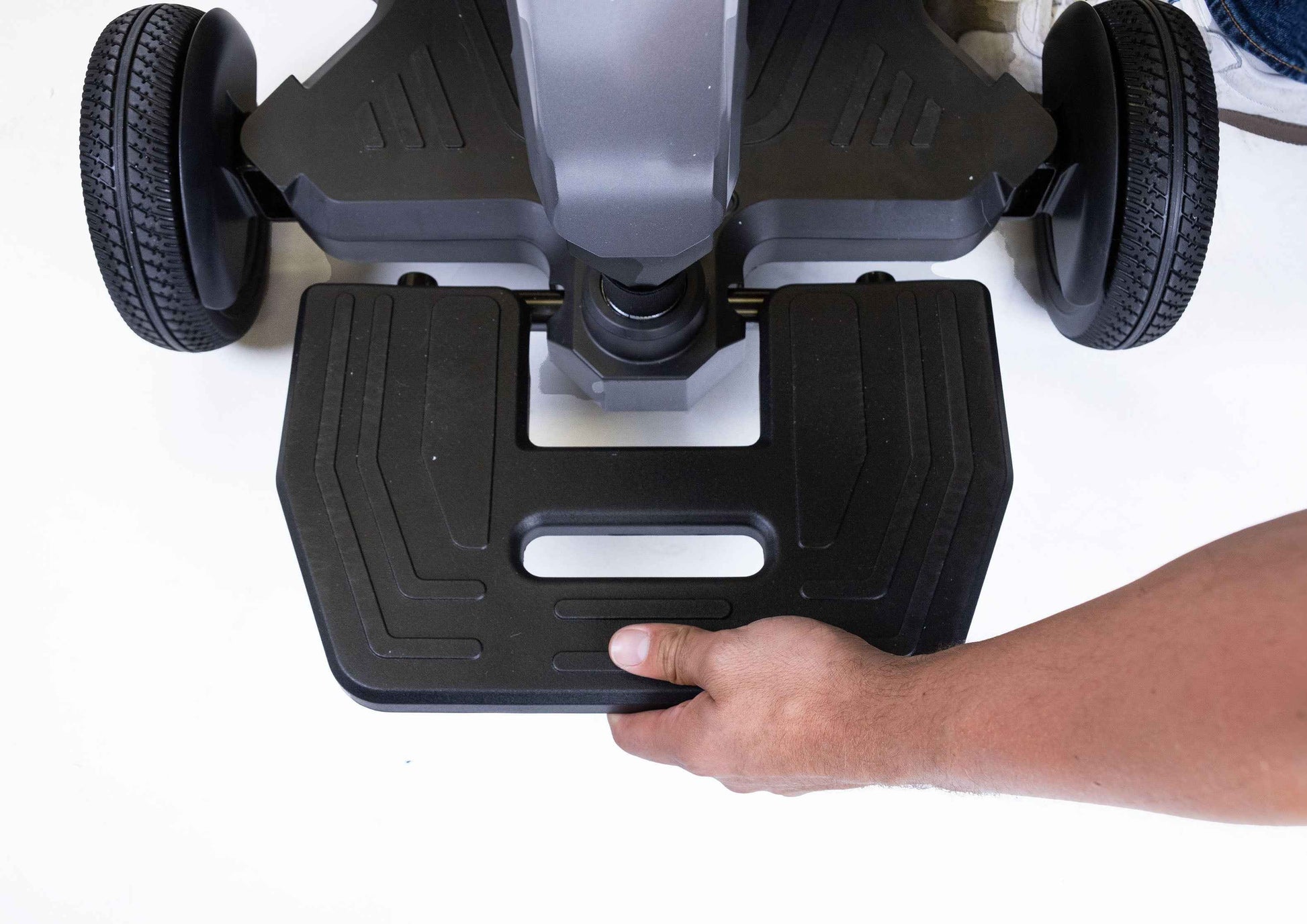 Front wheel close-up of Travel Buggy HELIX lightweight mobility scooter – CareMade