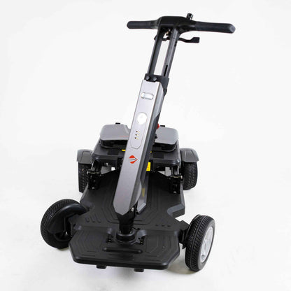 User riding the Travel Buggy HELIX mobility scooter outdoors – CareMade