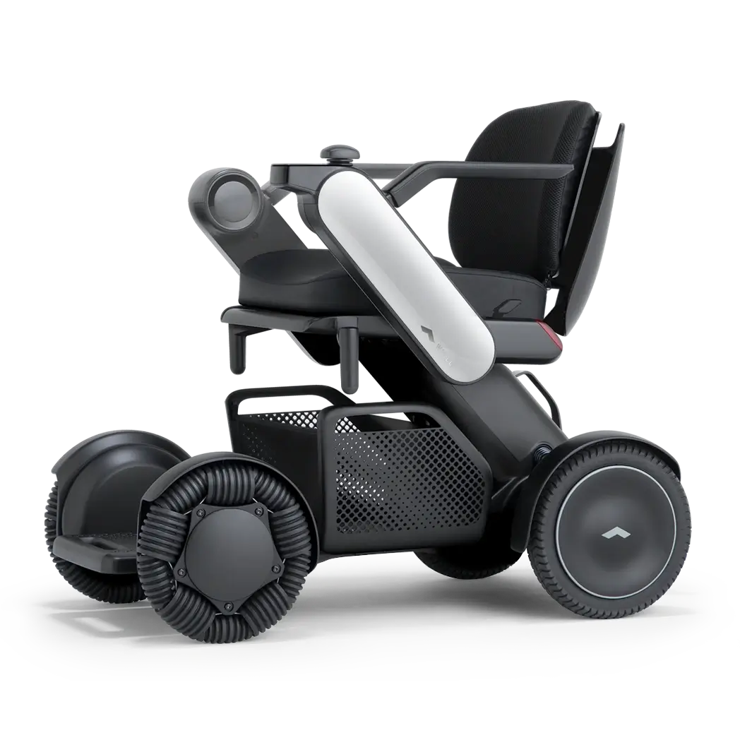WHILL Model C2 power wheelchair, three-quarter studio view