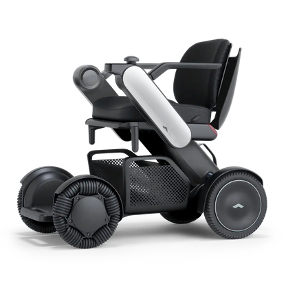 WHILL Model C2 power wheelchair, three-quarter studio view