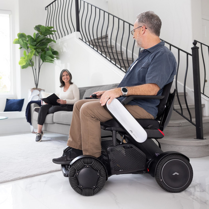 WHILL Model C2 power wheelchair in an everyday lifestyle setting
