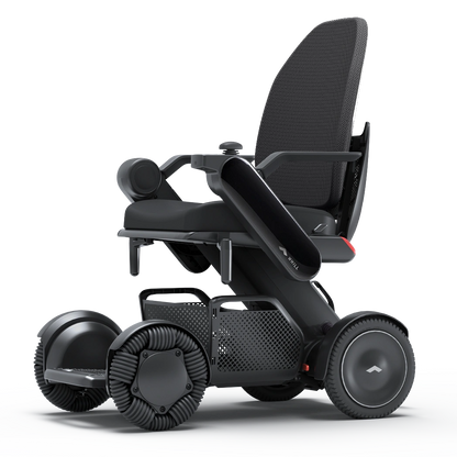 WHILL Model C2 High Back power wheelchair with black arm covers, studio view
