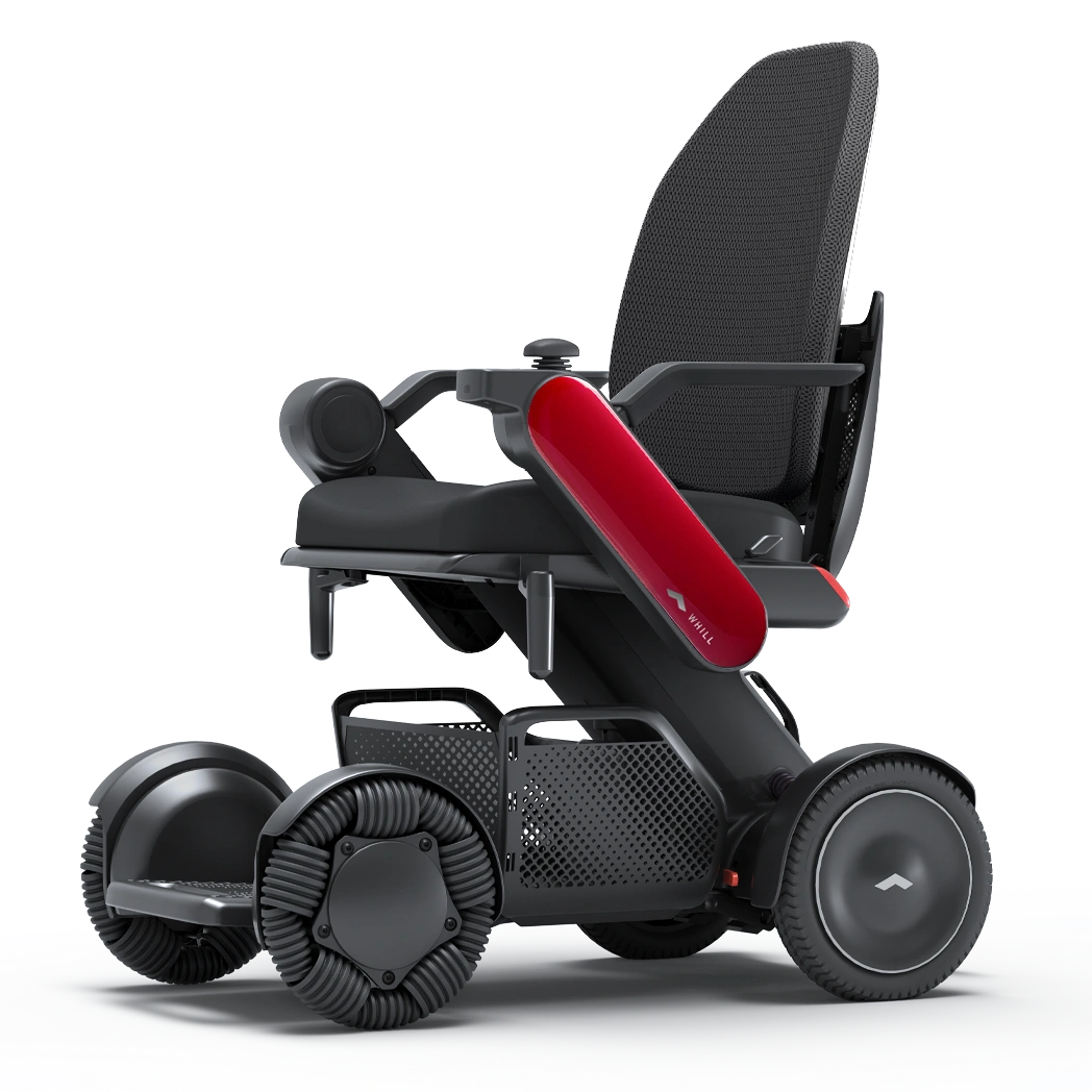 WHILL Model C2 High Back power wheelchair with red arm covers, studio view