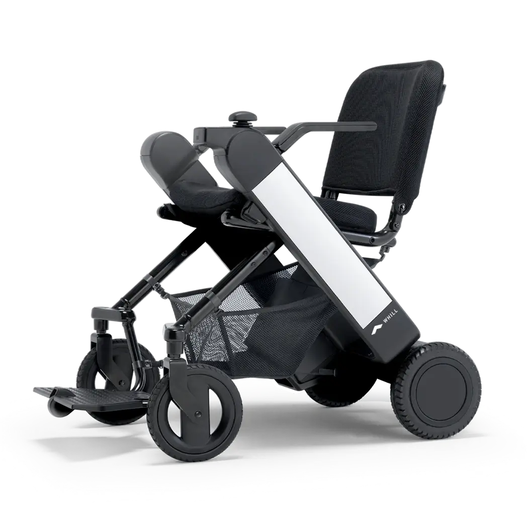 WHILL Model F folding power wheelchair, studio view