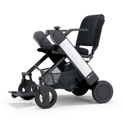 WHILL Model F folding power wheelchair, studio view