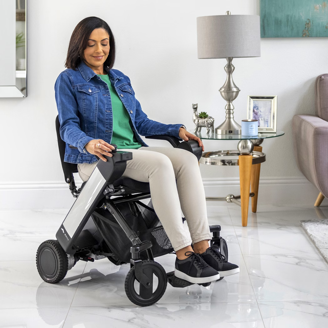 WHILL Model F folding power wheelchair indoors