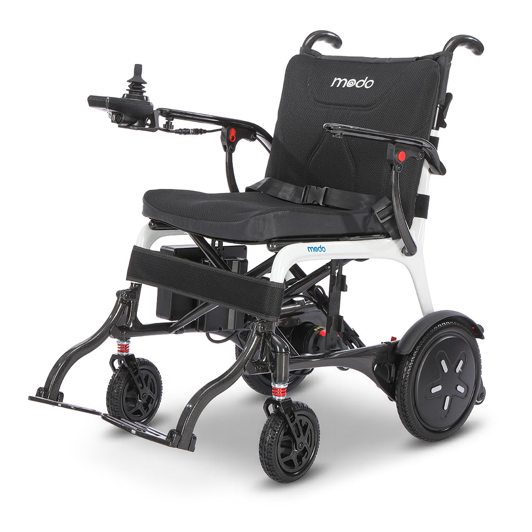 WHILL MODO Breeze carbon-fibre folding power wheelchair, three-quarter front studio view