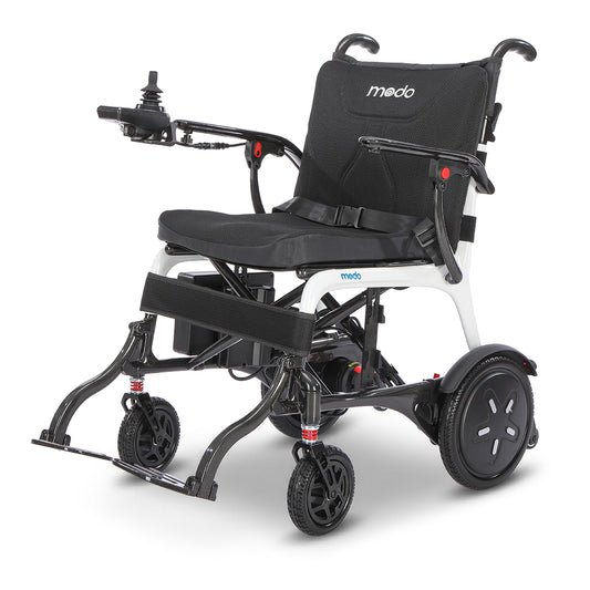 WHILL MODO Breeze carbon-fibre folding power wheelchair, three-quarter front studio view