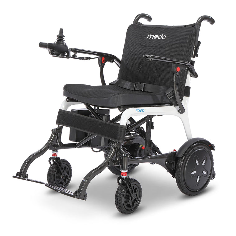 WHILL MODO Breeze carbon-fibre folding power wheelchair, three-quarter front studio view