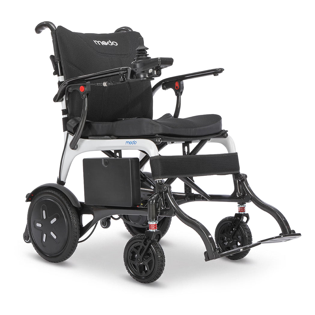 WHILL MODO Breeze carbon-fibre folding power wheelchair, alternate studio view