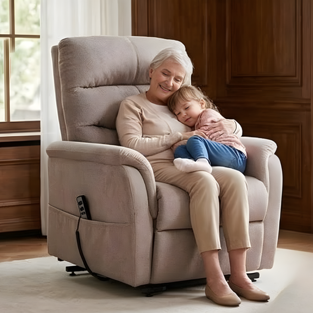 Woman and child sitting together on a beige recliner chair in a home setting.