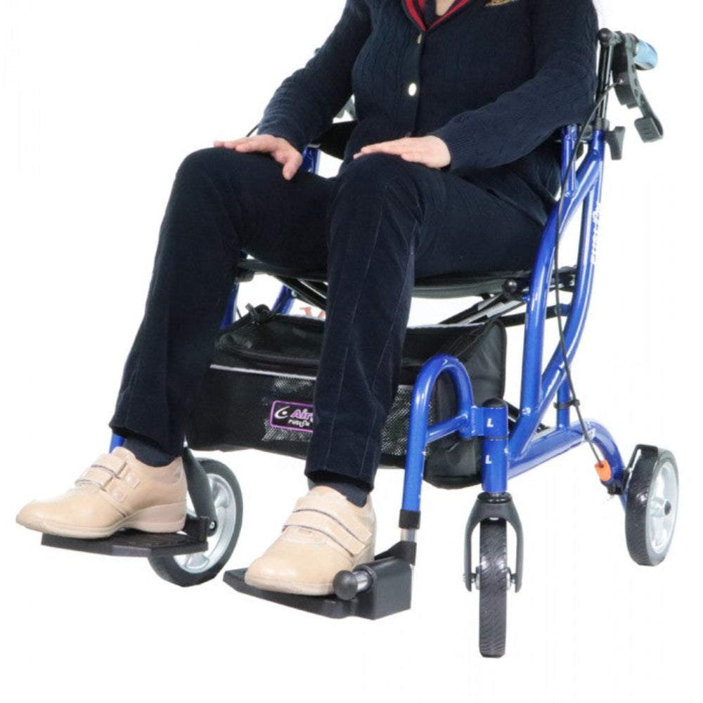 Lifestyle image of a woman resting comfortably with her feet up on the footrests of the blue Airgo Fusion F20 transport chair.