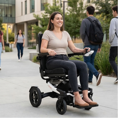 Lifestyle shot of a woman comfortably riding the Travel Buggy Grand Tourer GT along a paved path in a park.
